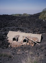 ITALY, Sicily, Mount Etna, A house destroyed by lava flow .