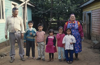 CHILE, People, Mapuche Indian couple with their grandchildren.