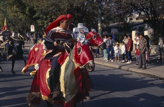 CHILE, Santiago, "La Barnechea.  Horse and riders in costume at the Fiesta de Cuasimodo,