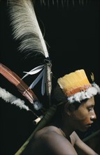 COLOMBIA, Vaupes Region, Tukano Tribe, "Portrait of Uriel, young man with fine feather head-dress