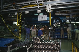 GERMANY, Sachsen, Workers on factory floor of Volkswagen production plant.