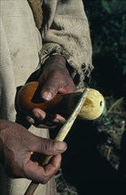 COLOMBIA, Sierra Nevada de Santa Marta, Kogi Tribe, Detail of a Kogi man holding his poporo/gourd