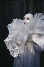 ITALY, Veneto, Venice, Carnival masquerader wearing Pierrot costume.