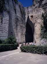 ITALY, Sicily, Siracuse, "Latomie stone quarries caves, also used for prisons. Tourists at the