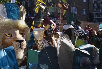 ENGLAND, London, Notting Hill carnival revellers in extravagant costume