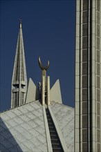 PAKISTAN, Islamabad, "Detail of the Shah Faisal mosque, white rooftop, minarets and crescent moon