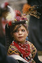PAKISTAN, North West Frontier Province, Bumburet, "A young Kalash girl in traditional dress at the