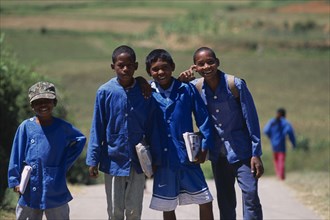 MADAGASCAR, People, Children, Near Ambositra. A group of rural school children wearing blue uniform
