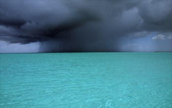 WEST INDIES, Turks and Caicos Island, Storm clouds over the ocean