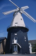 ENGLAND, Kent, Cranbrook, Union Watermill white weather boarded smock mill. It is the tallest mill
