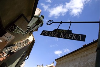 CZECH REPUBLIC, Bohemia, Prague, Hanging sign for the Franz Kafka Cafe in Golden Lane within Prague