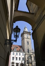 CZECH REPUBLIC, Bohemia, Prague, The Town Hall and Astronomical Clock seen through an arch in