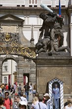 CZECH REPUBLIC, Bohemia, Prague, Tourists at the entrance to Prague Castle in Hradcany with a
