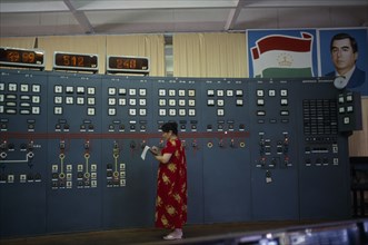 TAJIKISTAN, Nurek, "The main hall of the hydroelectric power station, a woman taking readings from