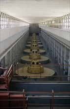 TAJIKISTAN, Nurek, Nine large turbines inside the hydroelectric power station.