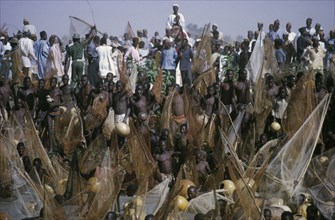 NIGERIA, North, Argungu, Crowds of spectators and competitors in annual three day fishing festival