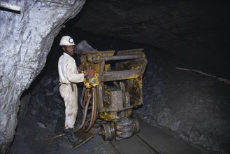 ZIMBABWE, Mashonaland East, Arcturus, Miner working underground in the Metallon Gold Zimbabwe