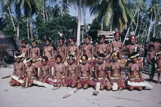 PACIFIC ISLANDS, Melanesia, Trobriand Islands, Kaileuna Island. Female dancers in costume greeting
