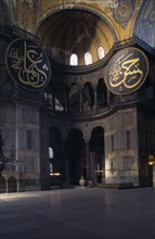 TURKEY, Istanbul, Sultanahmet.  Interior of Haghia Sophia with domed ceiling and decorative mosaic