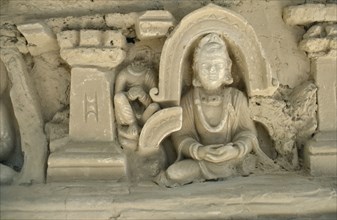 PAKISTAN, Punjab, Taxila, Jaulian Monastery. Stucco seated Buddha