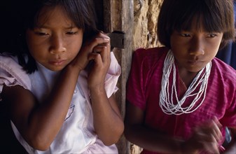 COLOMBIA, Amazonas, Santa Isabel, "Two young Macuna Indian girls, one wearing highly prized white