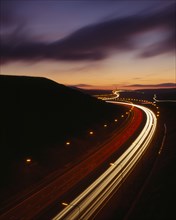 TRANSPORT, Traffic, Motorway, M62 Motorway. Elevated view over traffic in motion blur with light
