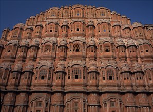 INDIA, Rajasthan, Jaipur, "Hawa Mahal. Exterior of pyramid shaped structure made of sandstone which