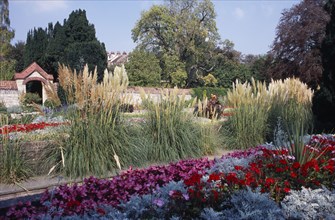 ENGLAND, East Sussex, Lewes, Southover Grange Gardens. Colourful flower bedding displays