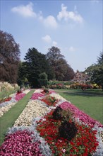 ENGLAND, East Sussex, Lewes, Southover Grange Gardens. Colourful flower bed displays