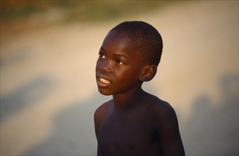 SOUTH AFRICA, Kwa Zula Natal, Matsulu Township. Portrait of young boy