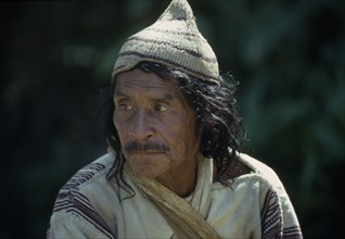 COLUMBIA, Sierra Nevada De Santa Marta, Kogi, Portrait of Kogi Indian Man wearing a hat