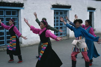 TIBET, Lhasa, Tibetan dancers in traditional costume.