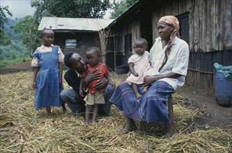 KENYA, Muhuroni, Peter Mwaura and family at his shamba at Chichila.  Peter practises organic
