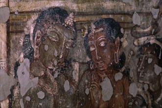 INDIA, Maharashtra, Ajanta Caves, Wall painting of two figures in Cave 17