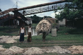 BANGLADESH, Industry, "Jute manufacture, workers with piled fibres."