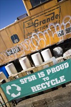 USA, New Mexico, Santa Fe, Recycling area by the railway lines and old trains