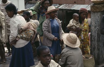 MADAGASCAR, Antananarivo, "Busy street scene; men, women and children."