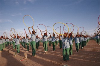 WESTERN SAHARA, SADR, "Parade of children with coloured hoops celebrating anniversary of the