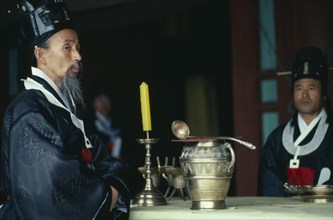SOUTH KOREA, Seoul, Confucian Priest taking part in Administers Rites in shrine
