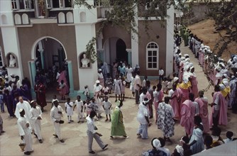 GHANA, Elmina, Easter procession outside Roman Catholic church.