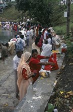 MAURITIUS, People, Crowds prepare offerings beside the Grand Bassin lake during the Maha