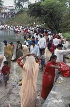 MAURITIUS, People, Crowds prepare offerings beside the Grand Bassin lake during the Maha