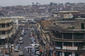 GHANA, Ashanti Region, Kumasi, Cityscape and busy street scene.