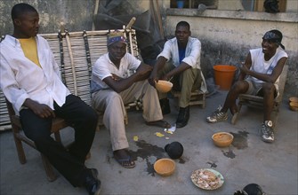 GHANA, North, Drinks, "Boys drinking pito, an alcoholic beverage made from millet or sorghum malt