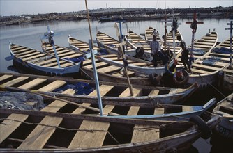 GHANA, Tema, Fishing boats moored in harbour.
