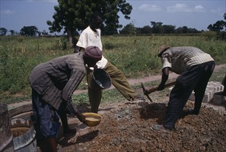 GAMBIA, People, Work, Men building rural school.