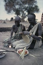 SUDAN, Work, Dinka women making baskets.
