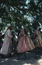 SUDAN, Tribal People, Dinka tribeswomen performing dance to bring rain.