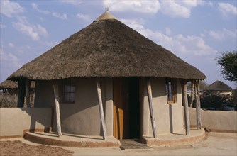 BOTSWANA, Kopong, Traditional circular hut with thatched roof.