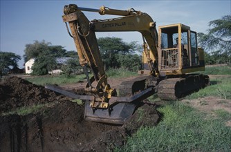 SUDAN, Water, Dutch company ILACO pilot project for drainage canal.  Caterpillar operated by Dinka